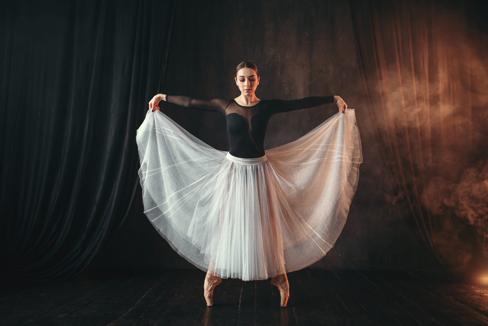 Classical ballet dancer in motion on the stage